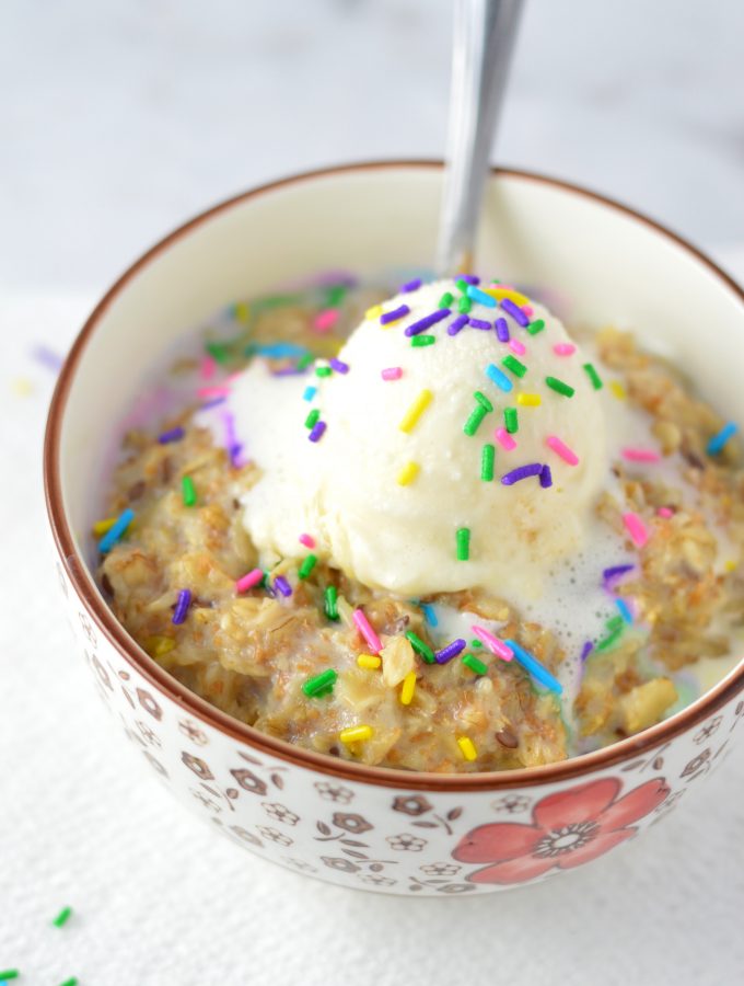 Easy Birthday Cake Oatmeal recipe for a quick and healthy way to celebrate your big day in the morning. Add ice cream if you want to make it extra special!