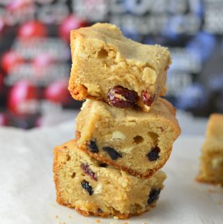 Dried Blueberry, Cranberry and White Chocolate Cookie Bars recipe makes for a great holiday recipe idea. These red, white and blue desserts are so quick and easy to make.