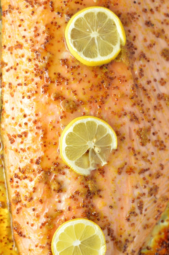 Quick and easy Honey Dijon Mustard Salmon recipe for a weeknight meal that is ready in under 20 minutes. My new go-to dinner idea!