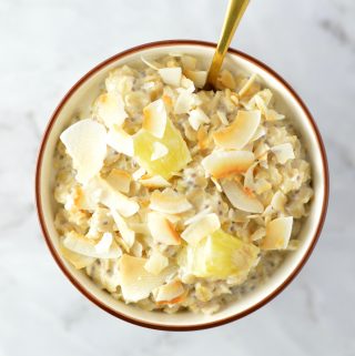 Easy Pina Colada Oatmeal recipe made with fresh or frozen pineapple. This is the perfect breakfast idea to make you feel like you are on holiday.