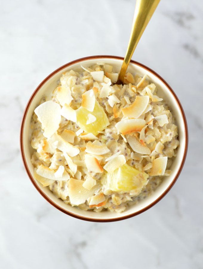 Easy Pina Colada Oatmeal recipe made with fresh or frozen pineapple. This is the perfect breakfast idea to make you feel like you are on holiday.