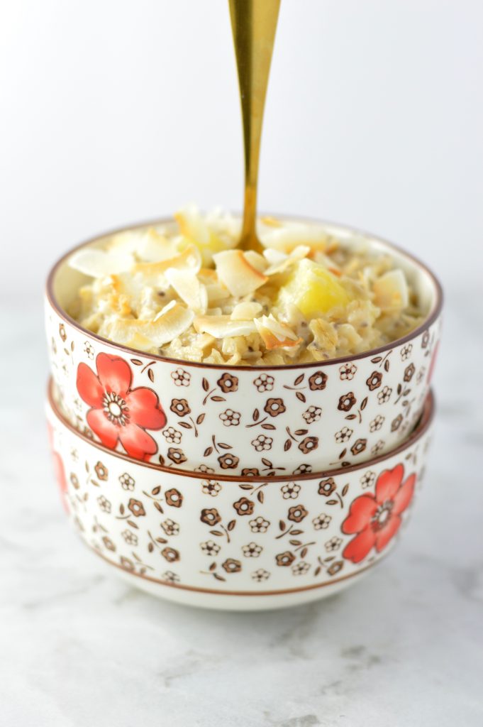 Easy Pina Colada Oatmeal recipe made with fresh or frozen pineapple. This is the perfect breakfast idea to make you feel like you are on holiday.