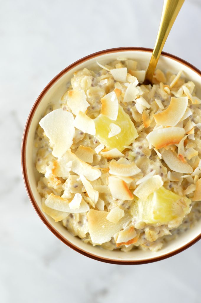 Easy Pina Colada Oatmeal recipe made with fresh or frozen pineapple. This is the perfect breakfast idea to make you feel like you are on holiday.