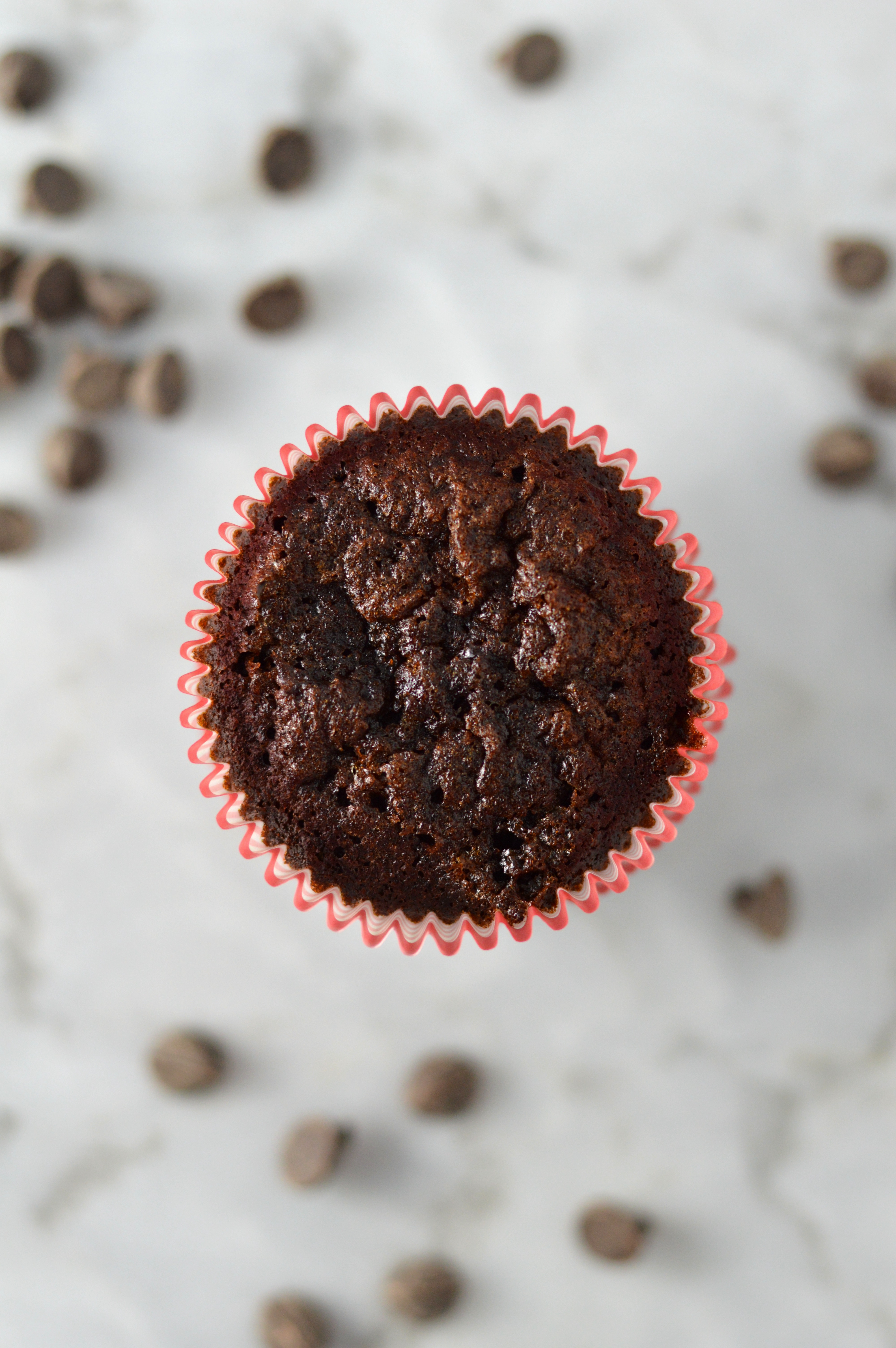 Easy Root Beer Muffins loaded with chocolate chips. This dessert recipe is sure to please everyone, and makes a great nut free snack idea.