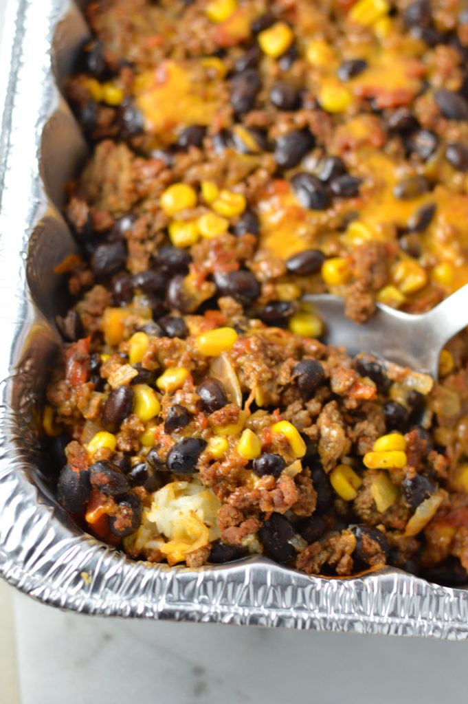  Easy Taco Rice Casserole Freezer Meal made with beans and ground beef. Great recipe to make ahead for the week as your weekly dinner meal prep.