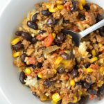  Easy Taco Rice Casserole Freezer Meal made with beans and ground beef. Great recipe to make ahead for the week as your weekly dinner meal prep.