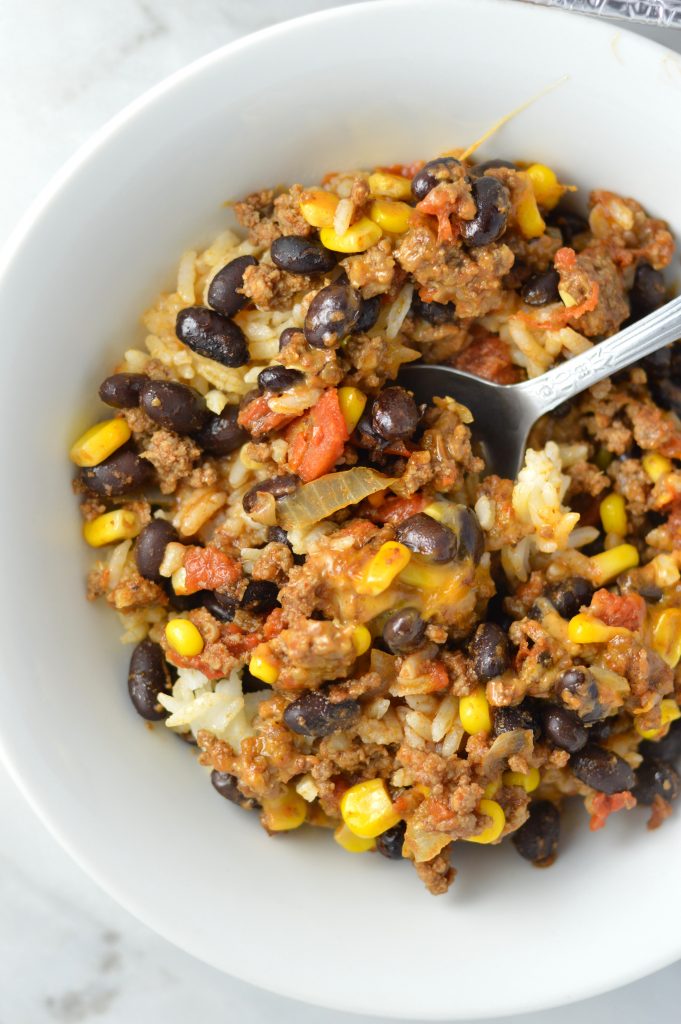  Easy Taco Rice Casserole Freezer Meal made with beans and ground beef. Great recipe to make ahead for the week as your weekly dinner meal prep.