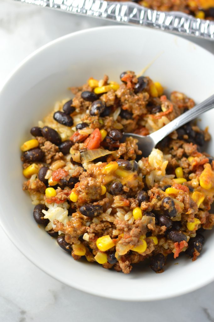  Easy Taco Rice Casserole Freezer Meal made with beans and ground beef. Great recipe to make ahead for the week as your weekly dinner meal prep.