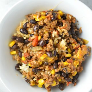  Easy Taco Rice Casserole Freezer Meal made with beans and ground beef. Great recipe to make ahead for the week as your weekly dinner meal prep.