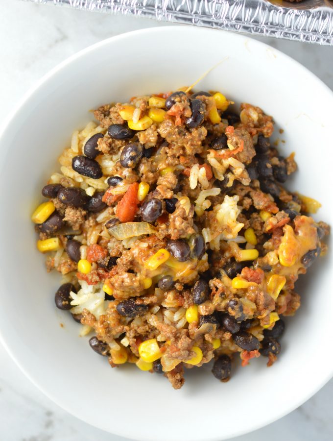  Easy Taco Rice Casserole Freezer Meal made with beans and ground beef. Great recipe to make ahead for the week as your weekly dinner meal prep.