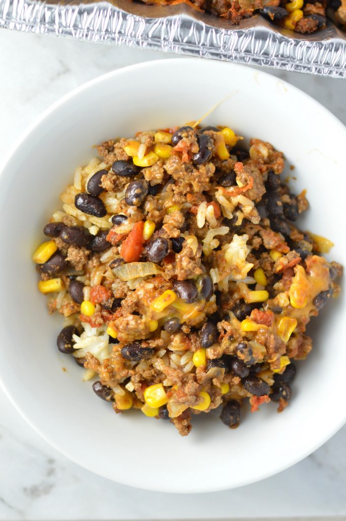  Easy Taco Rice Casserole Freezer Meal made with beans and ground beef. Great recipe to make ahead for the week as your weekly dinner meal prep.