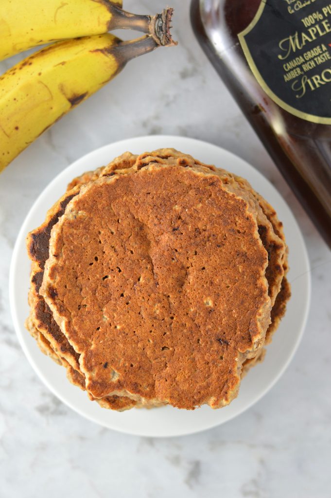 Healthy Whole Wheat Banana Applesauce Pancakes made with chia seeds. This recipe is a very filling breakfast idea, and a great way to use up 2 ripe bananas.