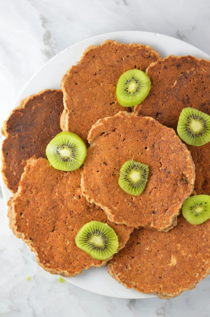 Healthy Whole Wheat Banana Applesauce Pancakes made with chia seeds. This recipe is a very filling breakfast idea, and a great way to use up 2 ripe bananas.