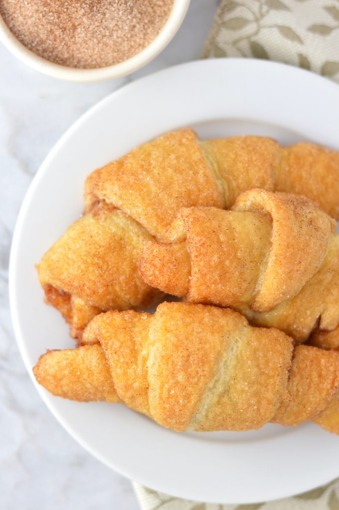 Easy Churro Crescent Rolls recipe makes a quick and simple dessert or breakfast idea. Made with only 3 ingredients and ready in under 20 minutes.