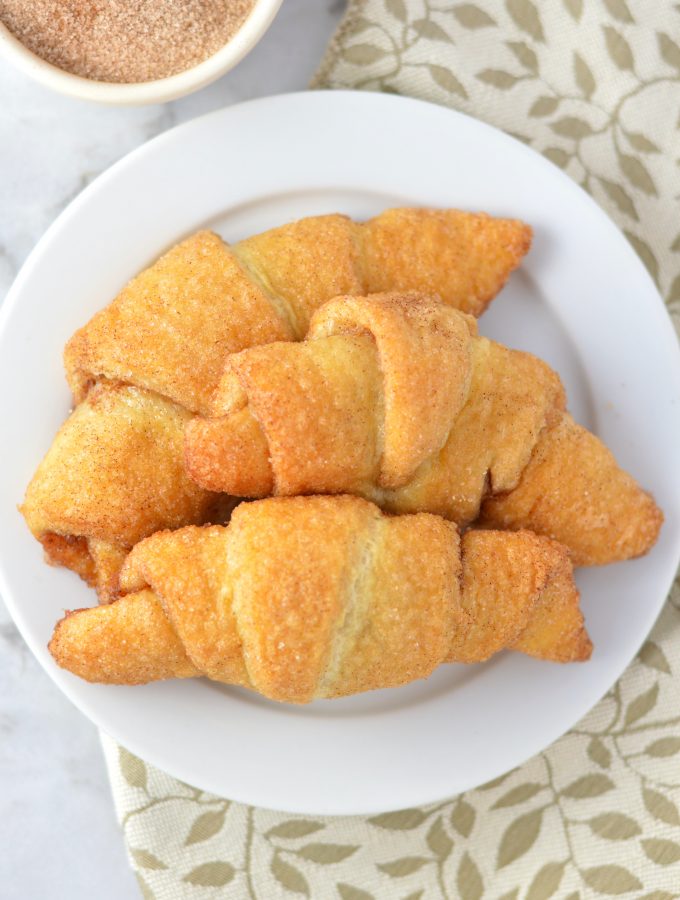 Easy Churro Crescent Rolls recipe makes a quick and simple dessert or breakfast idea. Made with only 3 ingredients and ready in under 20 minutes.