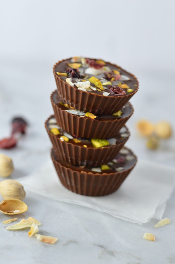 Pistachio, Cranberry and Coconut Peanut Butter Chocolate Cups recipe, that is so quick and easy to make. No bake, vegan and gluten free, they make a great last minute dessert idea.