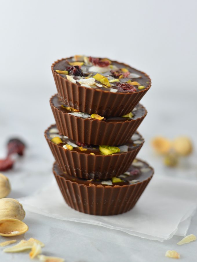 Pistachio, Cranberry and Coconut Peanut Butter Chocolate Cups recipe, that is so quick and easy to make. No bake, vegan and gluten free, they make a great last minute dessert idea.