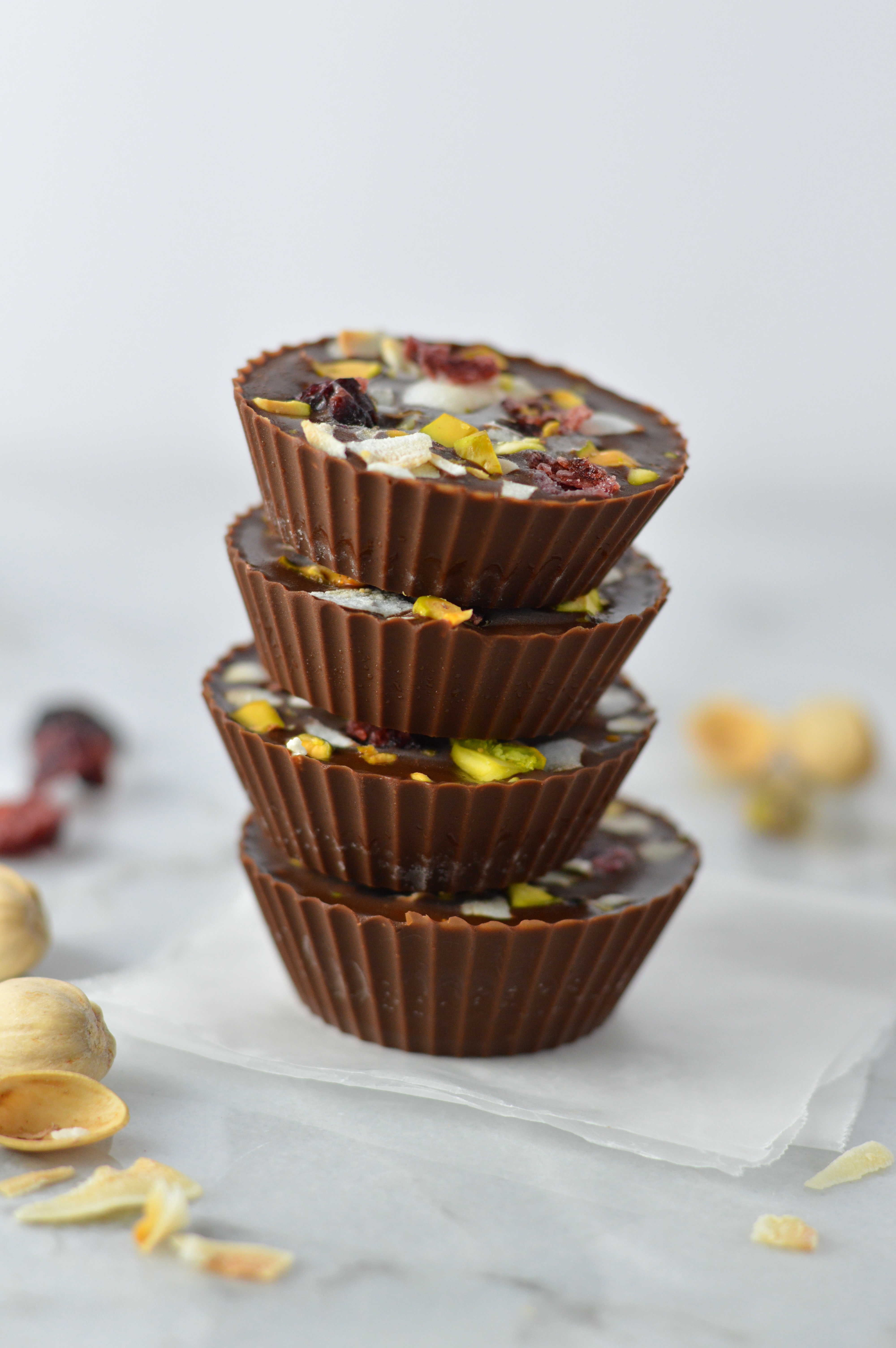 Pistachio, Cranberry and Coconut Peanut Butter Chocolate Cups recipe, that is so quick and easy to make. No bake, vegan and gluten free, they make a great last minute dessert idea.