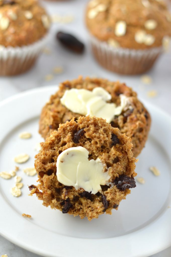 Healthy Whole Wheat Banana and Date Muffins recipe that are moist and super easy to make. Made with oats, bran and chocolate chips, they make a great grab and go breakfast idea.