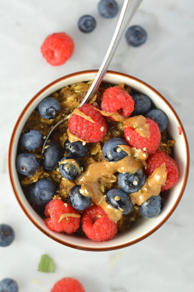 Easy Berry Peanut Butter Coffee Oats recipe. Topped with hemp hearts, this is one of my favourite oatmeals to make for breakfast or brunch.