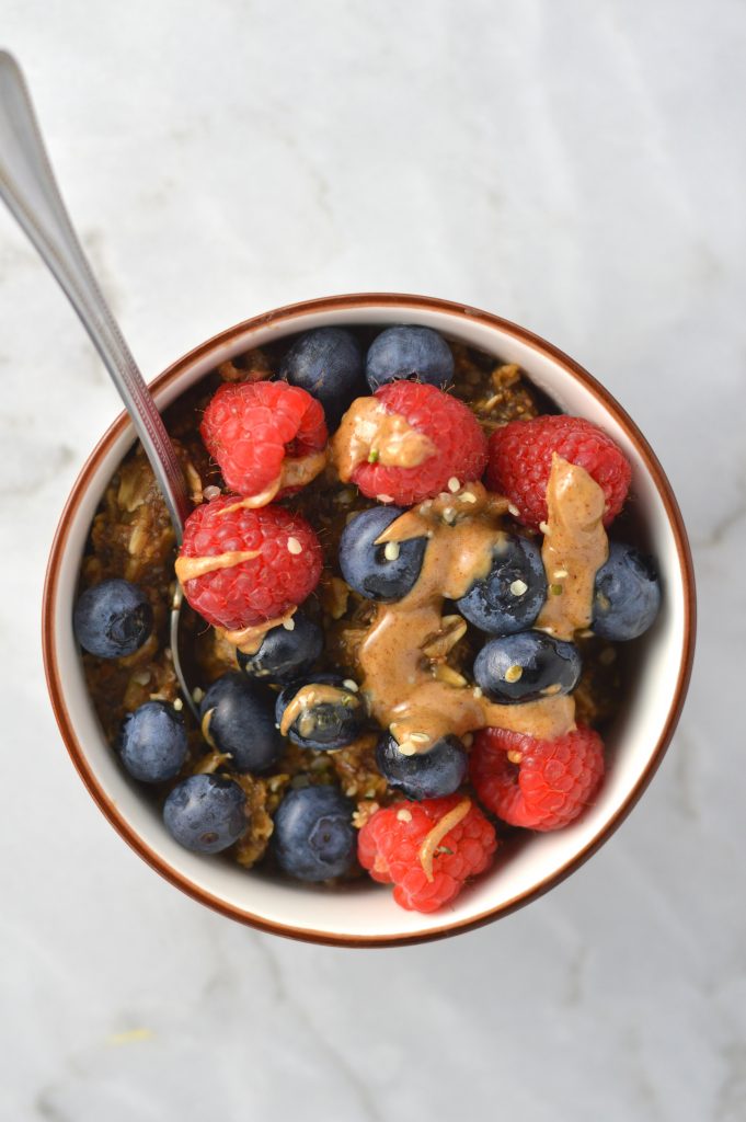 Easy Berry Peanut Butter Coffee Oats recipe. Topped with hemp hearts, this is one of my favourite oatmeals to make for breakfast or brunch.