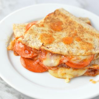 Easy Pepperoni Pizza Quesadilla recipe made with only 4 ingredients: flour tortillas, tomato paste, mozzarella cheese and pepperoni.