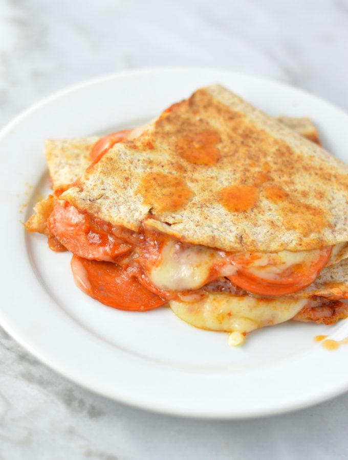 Easy Pepperoni Pizza Quesadilla recipe made with only 4 ingredients: flour tortillas, tomato paste, mozzarella cheese and pepperoni.