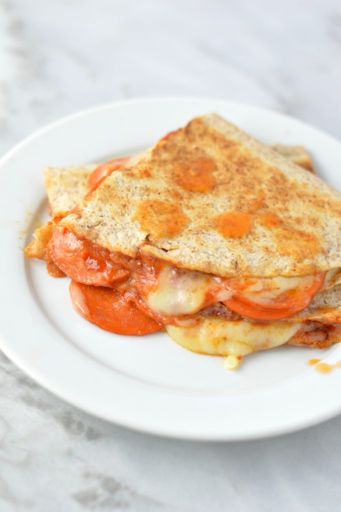 Easy Pepperoni Pizza Quesadilla recipe made with only 4 ingredients: flour tortillas, tomato paste, mozzarella cheese and pepperoni.