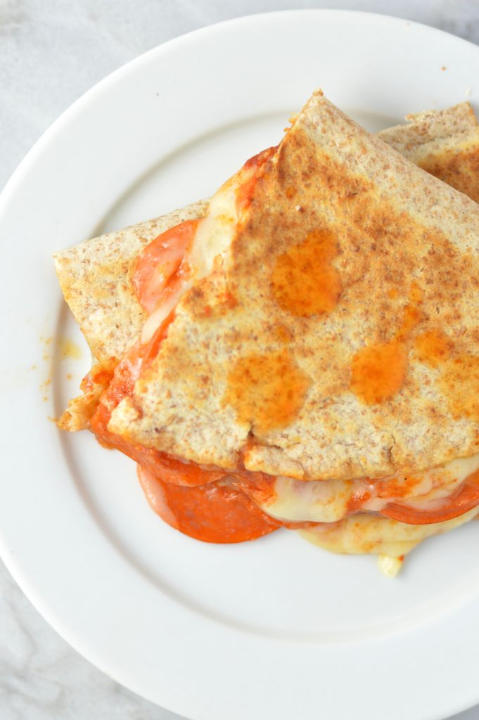 Easy Pepperoni Pizza Quesadilla recipe made with only 4 ingredients: flour tortillas, tomato paste, mozzarella cheese and pepperoni.