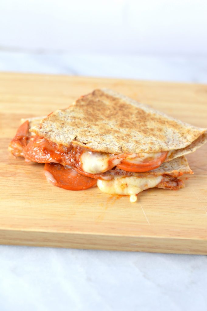 Easy Pepperoni Pizza Quesadilla recipe made with only 4 ingredients: flour tortillas, tomato paste, mozzarella cheese and pepperoni.