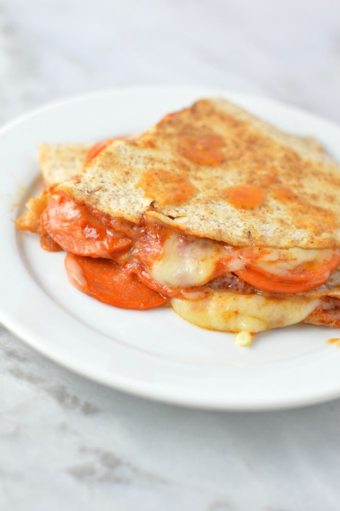 Easy Pepperoni Pizza Quesadilla recipe made with only 4 ingredients: flour tortillas, tomato paste, mozzarella cheese and pepperoni.