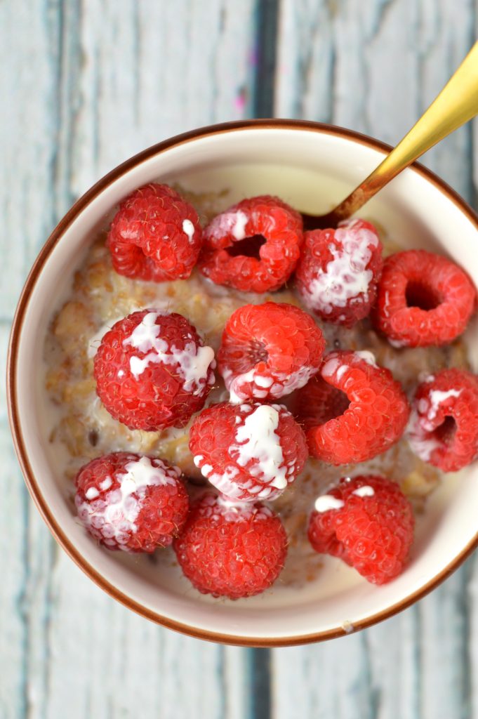 Quick and easy Raspberries and Cream Oatmeal recipe. I love making this in the summer with fresh raspberries and whipping cream.