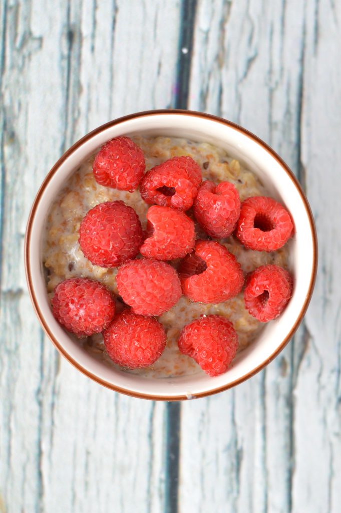 Quick and easy Raspberries and Cream Oatmeal recipe. I love making this in the summer with fresh raspberries and whipping cream.