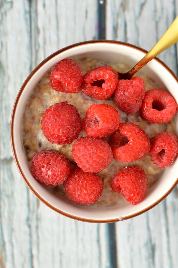 Quick and easy Raspberries and Cream Oatmeal recipe. I love making this in the summer with fresh raspberries and whipping cream.