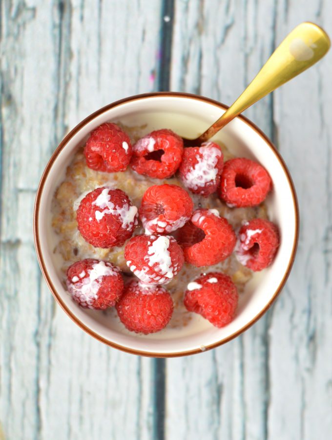 Quick and easy Raspberries and Cream Oatmeal recipe. I love making this in the summer with fresh raspberries and whipping cream.