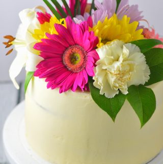 Classic White Wedding Cake with White Buttercream recipe from scratch. Save money by making your own homemade cake and customize it to your style.