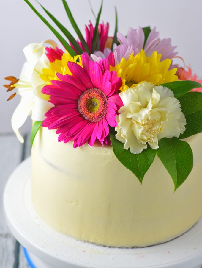 Classic White Wedding Cake with White Buttercream recipe from scratch. Save money by making your own homemade cake and customize it to your style.