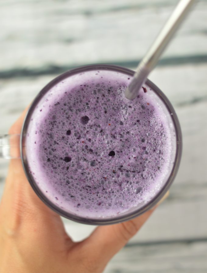 3 ingredient Blueberry Milkshake made with vanilla ice cream. This drink is so refreshing and such an easy recipe to make!