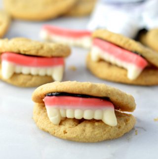 These Peanut Butter Vampire Cookies are the perfect quick and easy dessert recipe to make for your Halloween party. Super fun activity to do with kids.