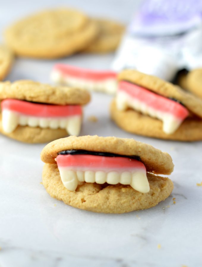 These Peanut Butter Vampire Cookies are the perfect quick and easy dessert recipe to make for your Halloween party. Super fun activity to do with kids.