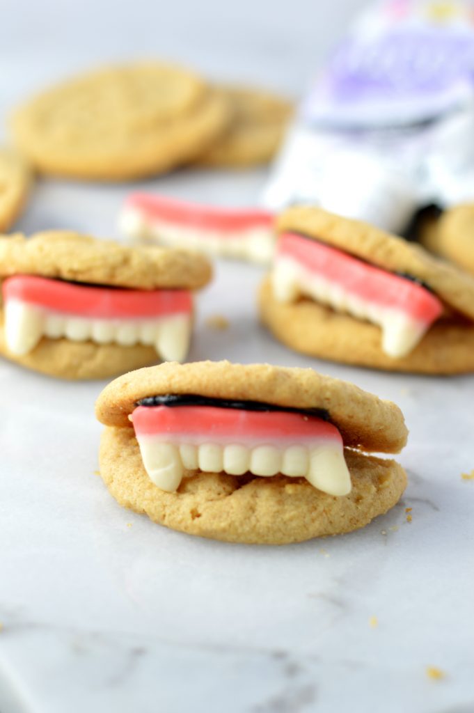 These Peanut Butter Vampire Cookies are the perfect quick and easy dessert recipe to make for your Halloween party. Super fun activity to do with kids.