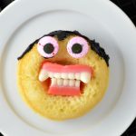 Halloween Baked Vampire Doughnuts recipe. Super quick and easy to make, this is so much fun for kids and adults alike.