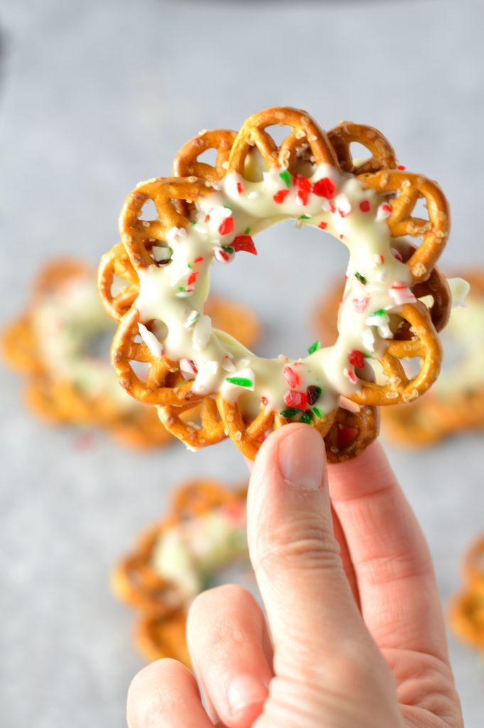 Easy Peppermint Pretzel Christmas Wreaths recipe. Perfect for a quick and simple last minute dessert idea.