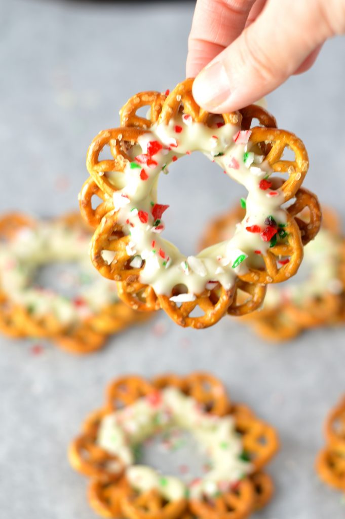 Easy Peppermint Pretzel Christmas Wreaths recipe. Perfect for a quick and simple last minute dessert idea.