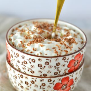 Easy Nutella Latte Oatmeal recipe. Can be vegan and healthy, or decadent with whipped cream on top.