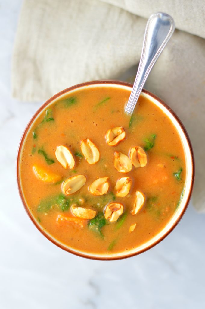 Easy Vegan Slow Cooker Sweet Potato Peanut Soup recipe. Vegetarian African peanut stew for a comforting weeknight dinner idea.