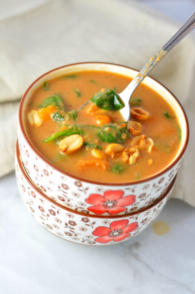 Easy Vegan Slow Cooker Sweet Potato Peanut Soup recipe. Vegetarian African peanut stew for a comforting weeknight dinner idea.