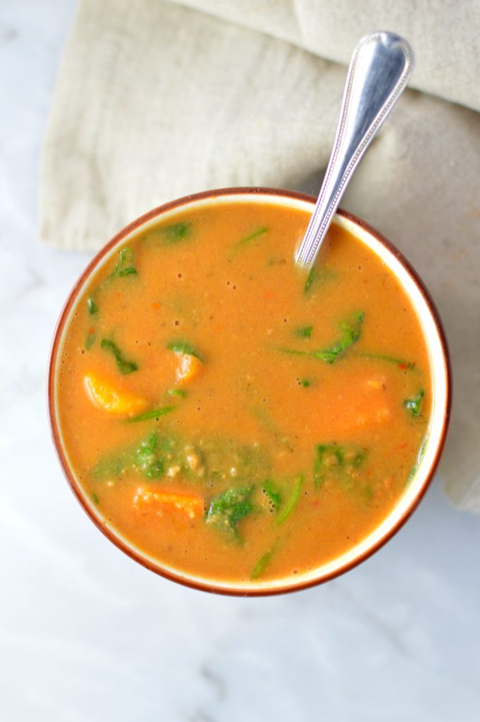 Easy Vegan Slow Cooker Sweet Potato Peanut Soup recipe. Vegetarian African peanut stew for a comforting weeknight dinner idea.