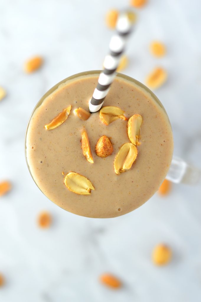 Healthy Chocolate Peanut Butter Banana Smoothie made with protein powder. Tastes like ice cream, it is perfect for breakfast or as a post workout snack