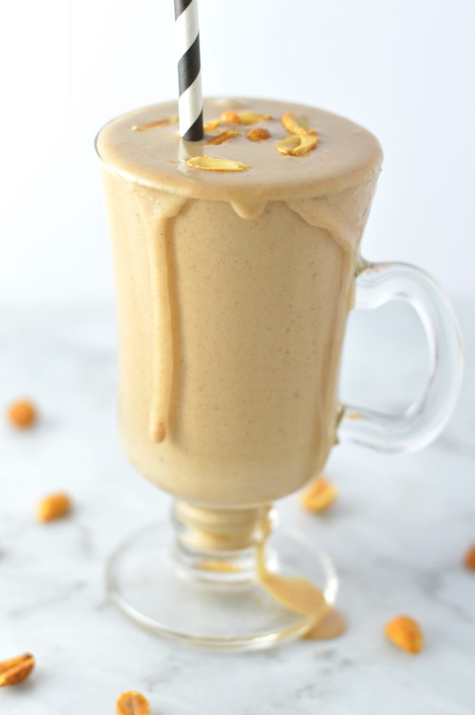 Healthy Chocolate Peanut Butter Banana Smoothie made with protein powder. Tastes like ice cream, it is perfect for breakfast or as a post workout snack